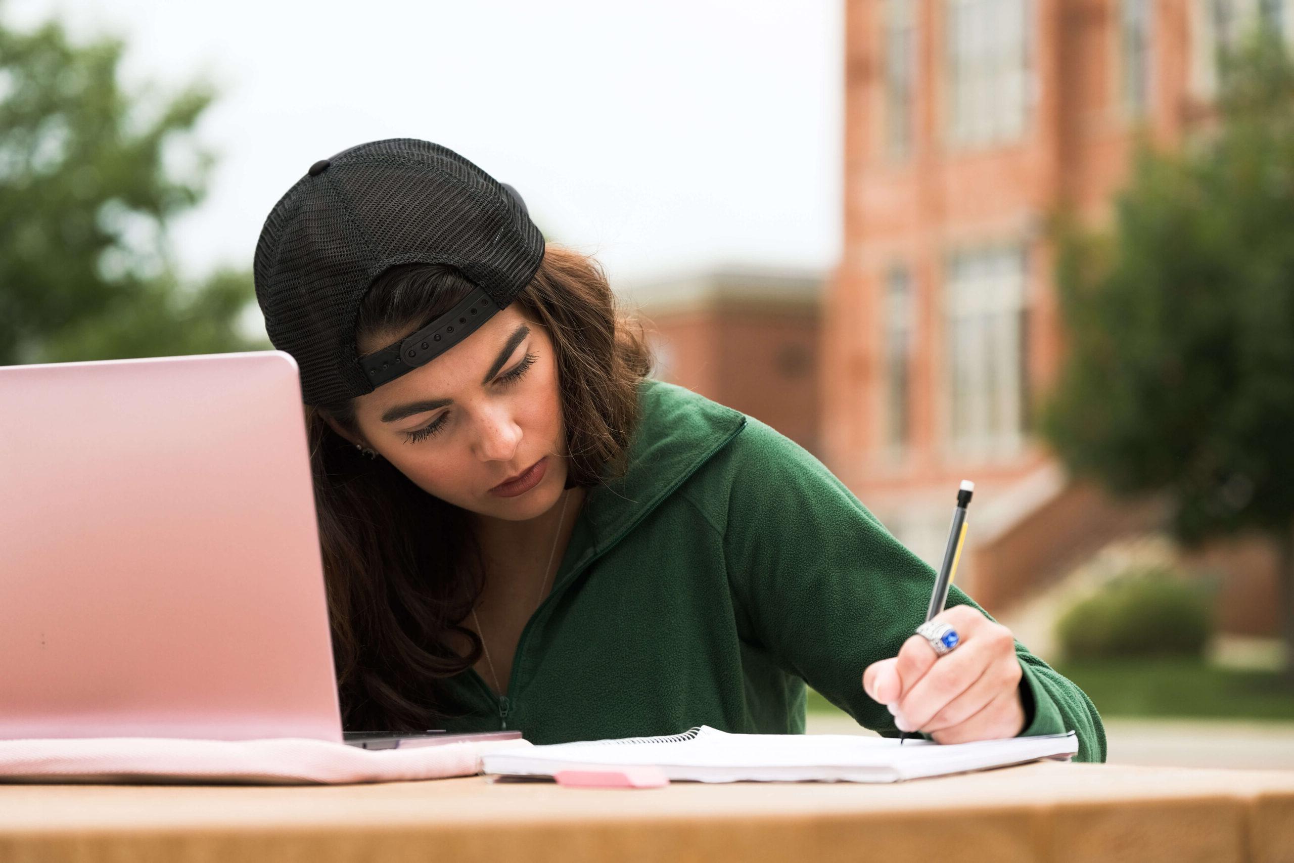 student studying outdoors